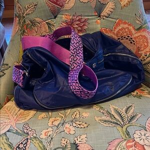 Zumba Fitness Purple and Pink Windbreaker Purse